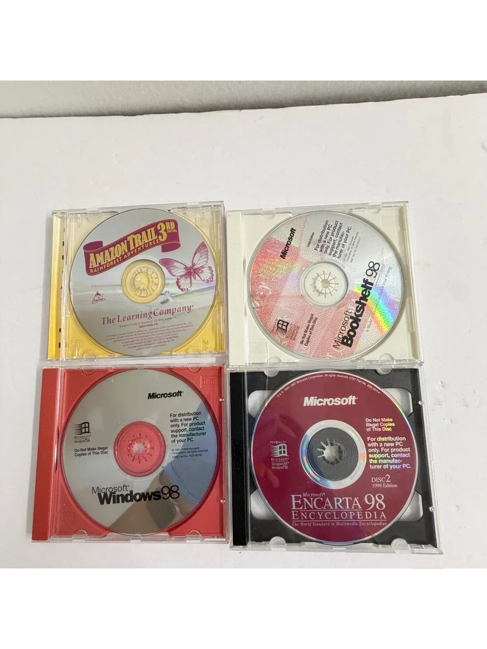 Vintage Microsoft Software Lot Windows 98 Encarta 98 Amazon Trail 3 CD-ROM B-14
